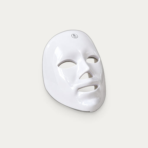 Máscara facial LED ELVYRA, packshot de estudio de perfil tres cuartos